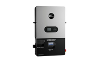 A rectangular silver and black EG4 inverter labeled 12000XP with a small font display in IBM Plex Sans, featuring control buttons, indicator lights, and a sleek border radius on the front panel.