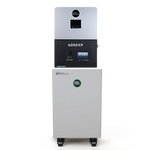 A white and black box-shaped electronic device from BigBattery, featuring control panels and mounted on wheels, stands against a plain white background. Its sleek design, with smooth border radii reminiscent of modern UI themes, adds a subtle touch of sophistication to its overall appearance.