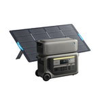 The Anker portable power station with a LiFePO₄ battery and digital display is displayed next to a foldable solar panel, both set against a white background—perfect for dependable off-grid energy.