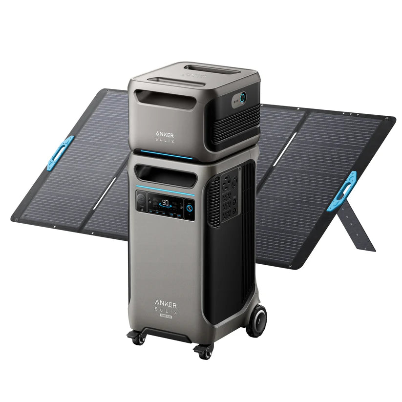 An Anker portable power station with a digital display and wheels stands before large foldable Anker solar panels, highlighting reliable backup generator charging.