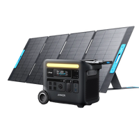 An Anker Solix F2600 portable power station, featuring a display screen and multiple charging ports, is displayed in front of a foldable four-panel solar panel.