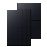 Two Anker black rectangular high-efficiency solar panels with a grid-like pattern are positioned side by side, slightly overlapping against a plain background.