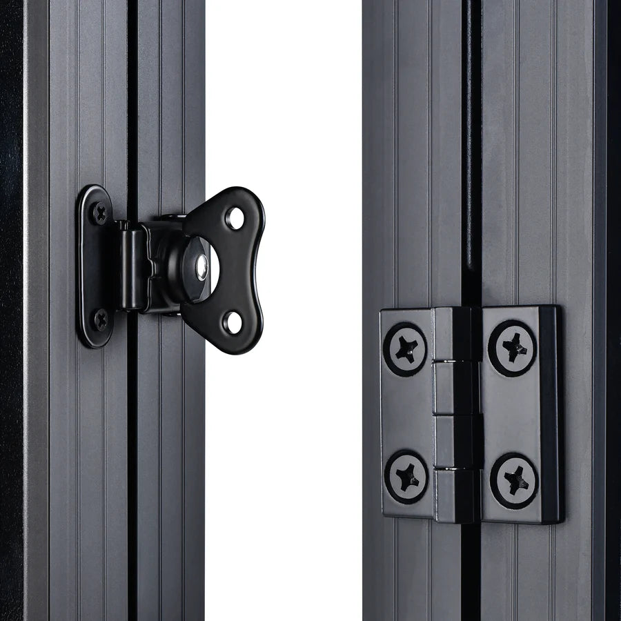 Close-up of black metal door hinges and a butterfly-shaped latch by Rich Solar on dark vertical panels, set against a white background—ideal for securing an off-grid solar trailer or portable solar charging kit.