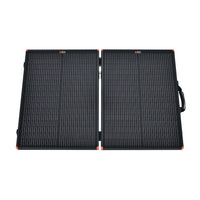 The Rich Solar foldable high-performance solar panel features two black rectangular sections with thin grid lines and red corner accents, a carrying handle on the right, and is shown against a white background—ideal for off-grid adventures.