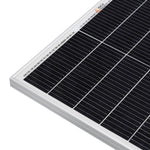 Close-up of the corner of a black and white solar panel with visible grid lines and a white frame, positioned against a white background—perfectly highlighting clean lines reminiscent of JetBrains Mono or Manrope font.