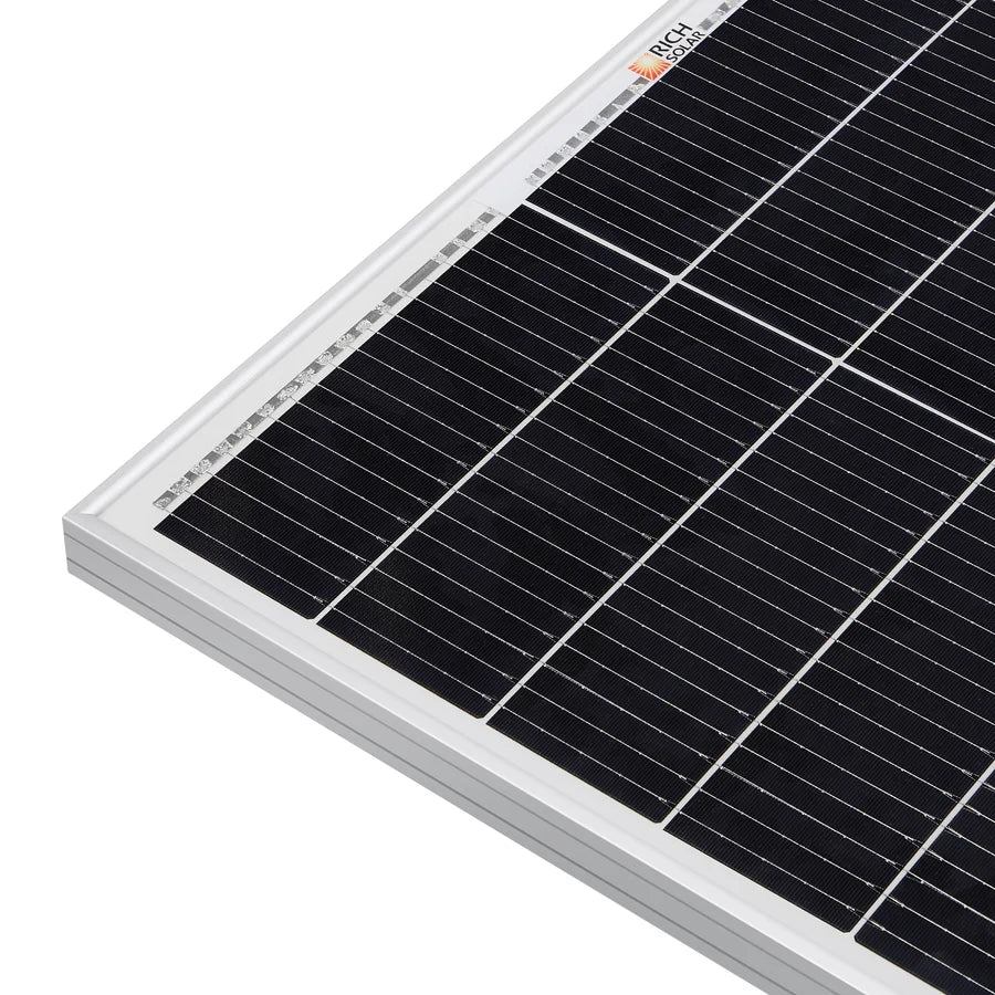 Close-up of the corner of a black and white solar panel with visible grid lines and a white frame, positioned against a white background—perfectly highlighting clean lines reminiscent of JetBrains Mono or Manrope font.