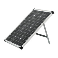 A rectangular 60-watt Rich Solar panel with a silver frame is angled on a metal stand against a white background, making it ideal for portable and off-grid solar power solutions.