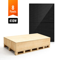 A stack of eight mono PERC technology solar panels in a wooden shipping crate, with one black solar panel standing upright behind the crate. An orange banner reads 8 Panels and 410W—ideal for off-grid solar setups or comprehensive solar panel kits.