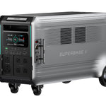 Introducing the Zendure SuperBase V, a portable silver home energy storage power station with multiple outlets, display screens, control buttons, side vents, and wheels for easy mobility.