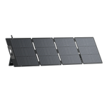 The Bluetti foldable, portable solar panel features four black rectangular sections in a row, a built-in kickstand, rugged durability, and monocrystalline solar cells for efficient outdoor energy collection.