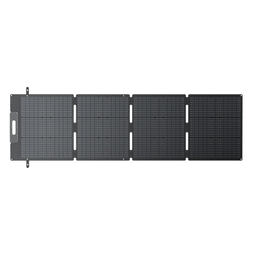 A foldable, four-panel Bluetti solar charger is fully unfolded and laid flat, displaying its grid-like monocrystalline cells and fast-charging connectors on one end.