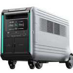 The Zendure SuperBase V is a large, portable home energy storage power station featuring smart energy management, a digital display, control panel, vents, four wheels for easy mobility, and silver design with teal accent lights.