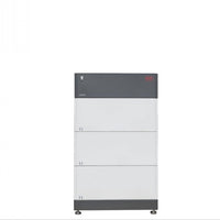 A tall, rectangular gray and white BYD Battery-Box storage unit with three stacked compartments stands on small feet against a white background, featuring lithium iron phosphate technology from BYD.