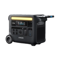 The Anker portable power station features a digital display, multiple outlets, large battery capacity, and is equipped with a handle and wheels for easy mobility—ideal for charging and powering devices on the go.