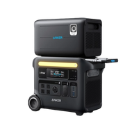 The Anker black portable power station set features multiple outlets, solar input, a digital display, and a compact battery pack stacked on top—ideal for home backup power.
