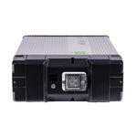 The Fortress Power unit is a rectangular, black and gray energy storage solution with a central digital display, indicator lights on the front, ribbed sides, and a robust industrial design.