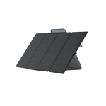 The Ecoflow portable black solar panel features four rectangular sections and a foldable design, propped up on a stand against a white background.