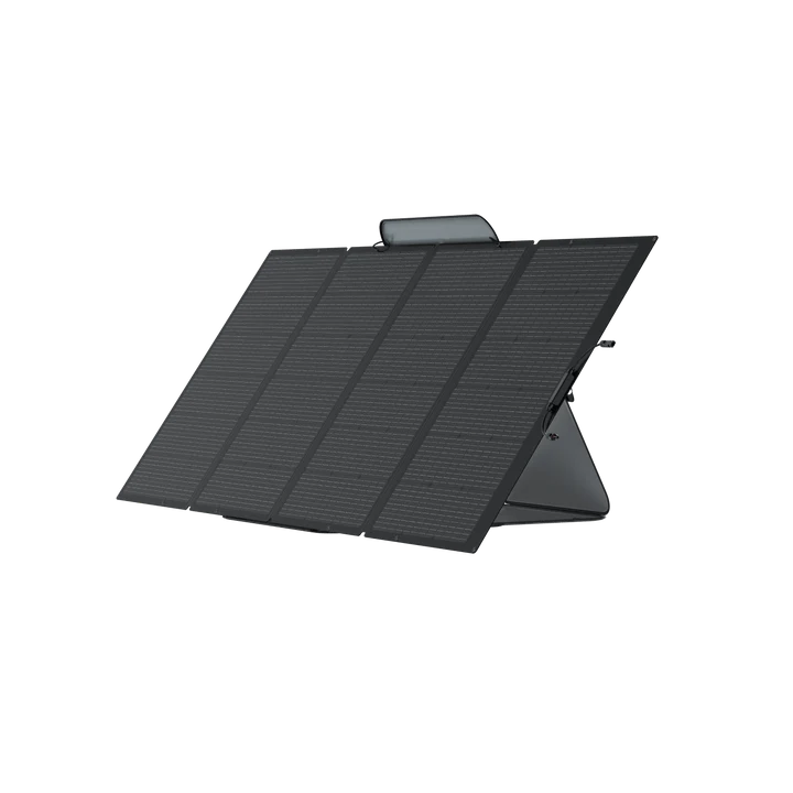The Ecoflow portable black solar panel features four rectangular sections and a foldable design, propped up on a stand against a white background.