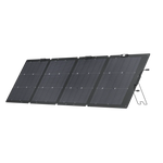 An Ecoflow portable, foldable waterproof solar panel with four connected black sections is propped up at an angle using built-in stands.