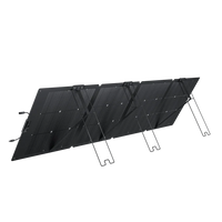An Ecoflow black portable waterproof solar panel is unfolded and propped up at an angle with built-in stands, displaying its grid of solar cells for outdoor use.