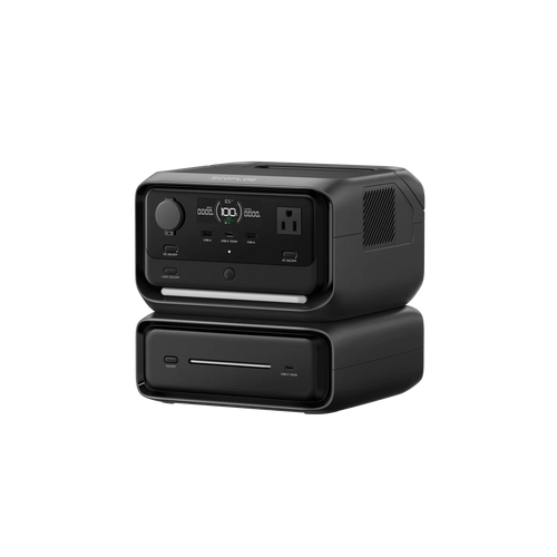 An Ecoflow black portable power station with expandable capacity features a digital display, control knob, outlets, and ventilation openings. Its stacked on a matching base and isolated on a transparent background.