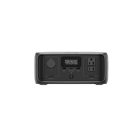 The Ecoflow compact power station features a digital display, AC outlets, DC car port, USB ports, and a 245Wh capacity—all in a sleek black rectangular design set against a plain background.