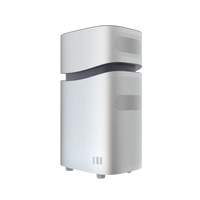 A sleek, modern white Mango Power air purifier with rounded edges, perforated vents, and a black accent band stands upright—an ideal companion for your Mango Power Union portable battery system.