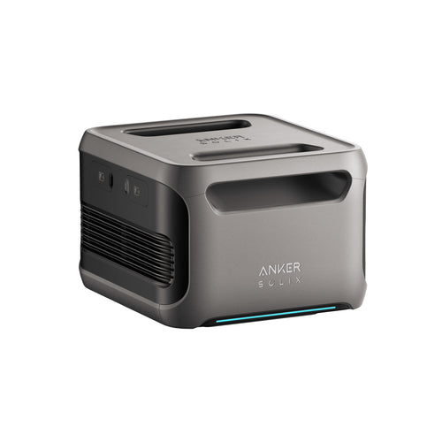 Anker’s compact gray SOLIX portable power station features expandable capacity, a top handle, side vent and control buttons, with the Anker logo on the front, all set against a white background.