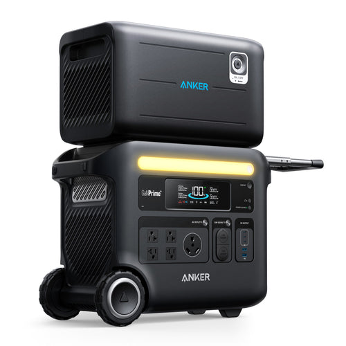 Anker’s black portable power station with wheels, multiple outlets, and a display screen is stacked with an extra power module. Both units use LFP batteries for efficient energy conversion in a modern, compact design.