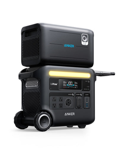 Anker’s black portable power station with wheels, multiple outlets, and a display screen is stacked with an extra power module. Both units use LFP batteries for efficient energy conversion in a modern, compact design.