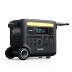 A black Anker Solix F2600 portable power station features wheels, a handle, LFP battery, multiple outlets, USB ports, LED strip light, and a display screen. It’s solar panel compatible for easy outdoor charging.