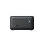 A black, rectangular Anker portable power station with a textured front panel, blue circular power button, solar charging capability, and Anker logo is displayed against a plain white background.