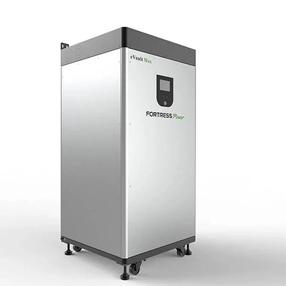 A large, rectangular silver Fortress Power eVault Max LFP battery storage unit with a black top and digital display stands on four wheels against a plain white background.
