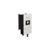 A gray Sol-Ark hybrid inverter is wall-mounted, featuring a small digital display and control buttons on the front, designed for efficient solar energy generation and battery storage.